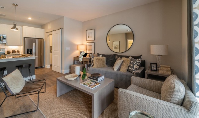 a living room with a couch and a table