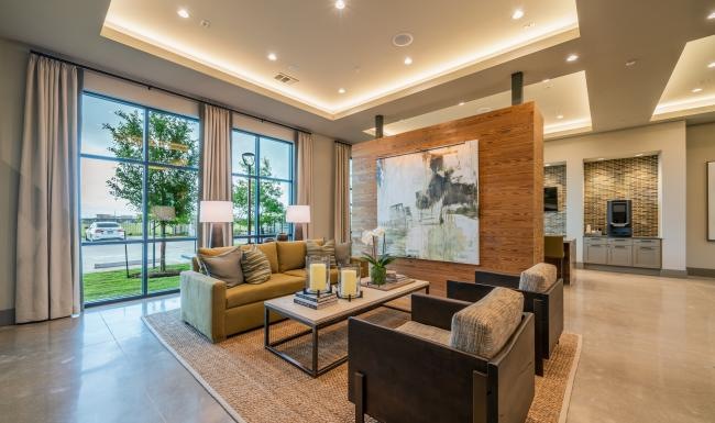 Find your perfect fit at Granary Flats a living room with  large glass windows