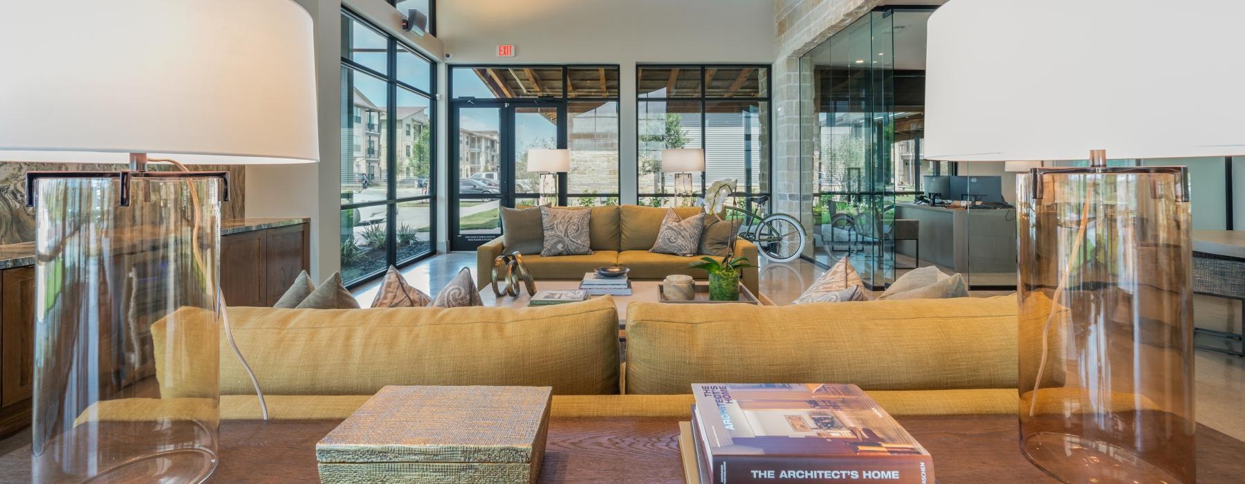 a room with a couch and books